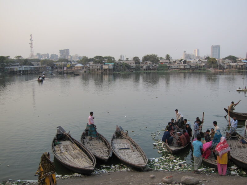 Boats a long a river in Dhaka, Bangladesh 2015. Photo by Dennis Chao.